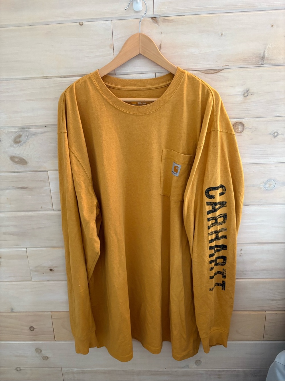 Carhartt Men’s Long-Sleeve Pocket Tee in Mustard Yellow/Burnt Orange